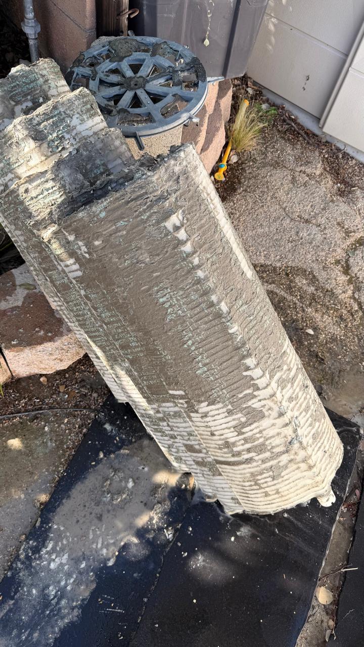 Dirty pool filter cartridges caked with calcium scale and algae before cleaning by KLUG Pool Services